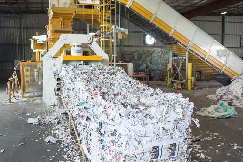 Papers being baled for recycling shredding